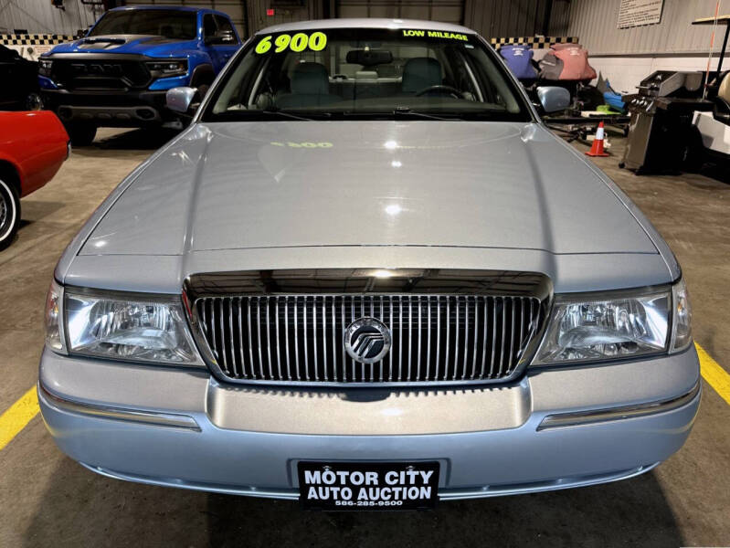 mercury grand marquis 2004 2MEFM75W14X609415 image mercury grand marquis 2004 2MEFM75W14X609415 image